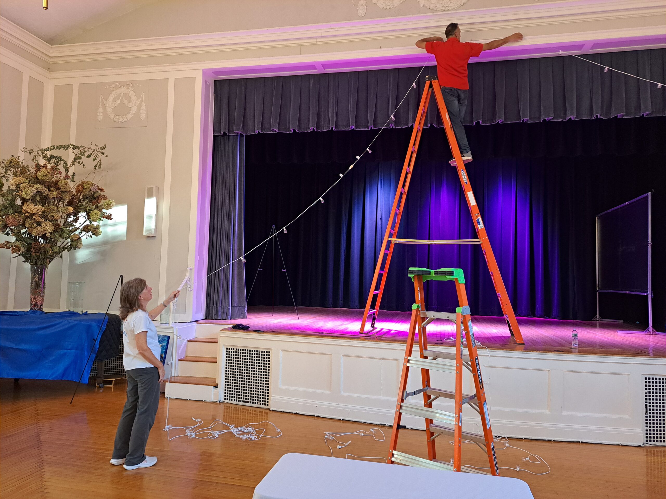 Sue ODonnell putting up lights