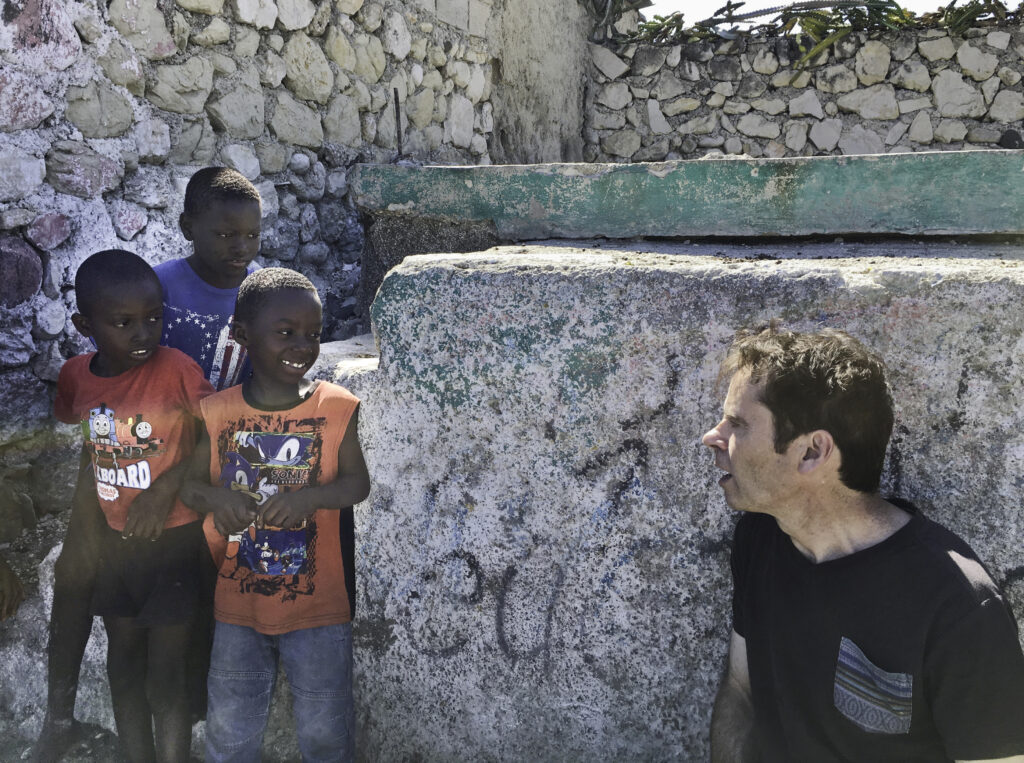 Jim near Lamp's Cite Soleil health center